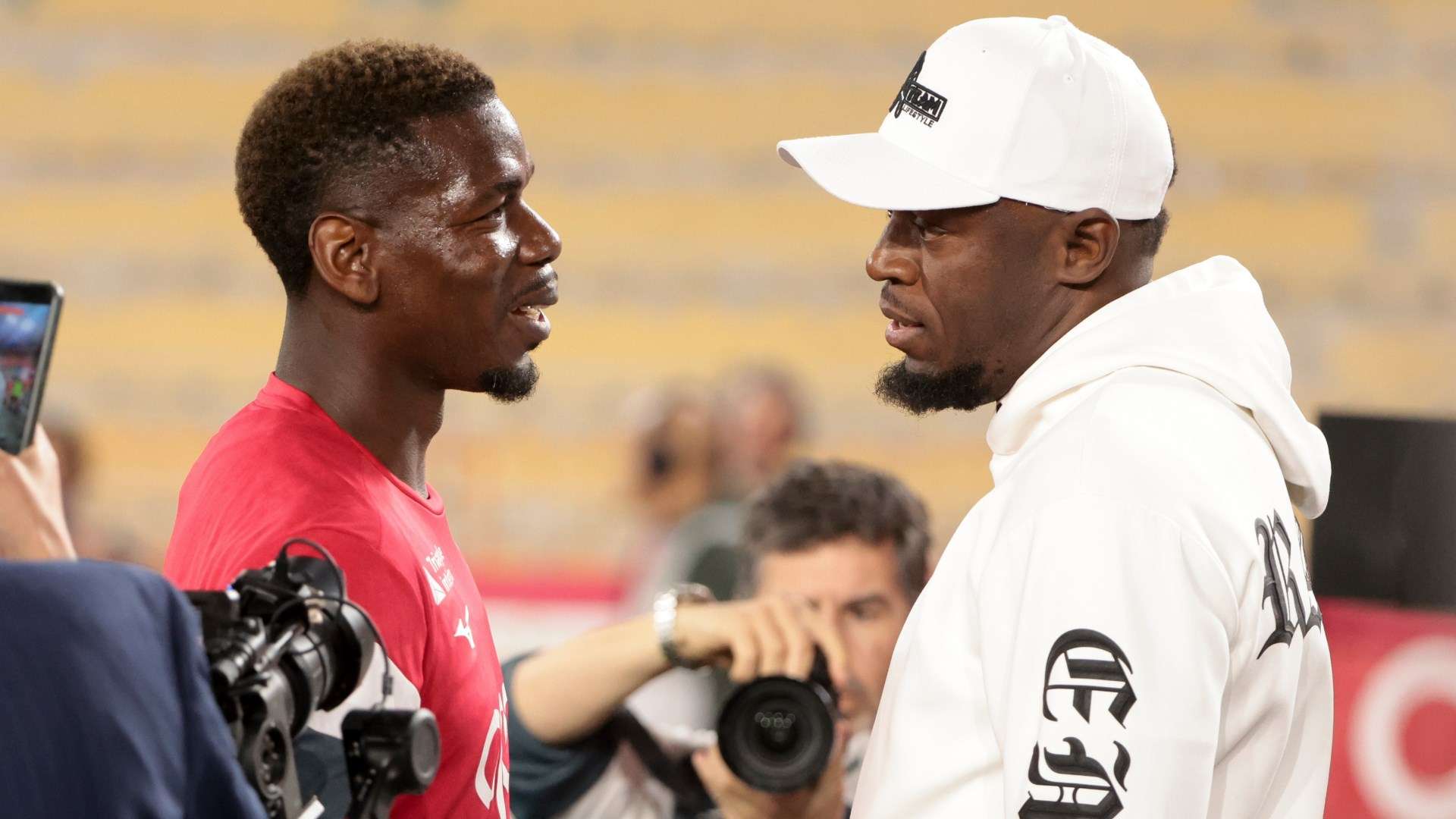 Paul Pogba Meets Usain Bolt Pitchside on Return to Monaco Squad